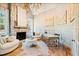 Bright and airy living room with fireplace and detailed finishings at 103 Patriot Way, Apex, NC 27523