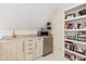 Wet bar area with sink, beverage refrigerator and shelving at 103 Patriot Way, Apex, NC 27523