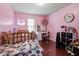 Bright bedroom featuring bed with a Hello Kitty theme and an adorable vanity at 106 Northwinds Dr, Wendell, NC 27591