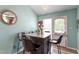 Dining area featuring table with seating for four and chandelier light fixture at 106 Northwinds Dr, Wendell, NC 27591