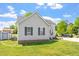 Charming single-story home with gray siding and a well-manicured lawn and fenced yard at 106 Northwinds Dr, Wendell, NC 27591