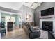 Spacious living room features a fireplace, an open layout, and a modern decor at 106 Northwinds Dr, Wendell, NC 27591