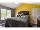 Comfortable main bedroom featuring a large bed and natural light from the window at 106 Northwinds Dr, Wendell, NC 27591