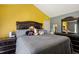 Comfortable main bedroom featuring a large bed and natural light from the window at 106 Northwinds Dr, Wendell, NC 27591