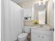 Classic bathroom with shower, toilet, vanity and decorative touches at 107 Oxford Creek Rd, Cary, NC 27519