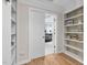 Bedroom doorway shows wood floors and built in shelving at 107 Oxford Creek Rd, Cary, NC 27519