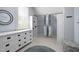 Charming walk-in closet with carpet, and built-in shelving for ample storage at 107 Oxford Creek Rd, Cary, NC 27519