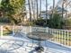 Cozy deck with white railing and outdoor seating, perfect for relaxing or entertaining guests outdoors at 11 Whitburn Pl, Durham, NC 27705