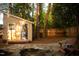 Backyard with a shed, fire pit, patio, and lounge chairs at 112 E Edgewood Dr, Durham, NC 27704