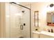 Modern bathroom with a glass-enclosed shower, white subway tile, and sleek fixtures at 112 E Edgewood Dr, Durham, NC 27704