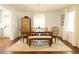 Bright dining room with a wooden table and seating for six at 112 E Edgewood Dr, Durham, NC 27704