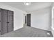 Bedroom offers soft carpet and a closet at 112 Edmondson Dr, Willow Springs, NC 27592