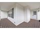 Wrap around porch showing white railing, a second entrance, and wood flooring at 112 Edmondson Dr, Willow Springs, NC 27592