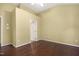 Bedroom with hardwood flooring, neutral walls, and a ceiling fan at 115 White Lake Ct, Cary, NC 27519