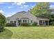 Beautiful home with a well-manicured lawn and lovely landscaping at 115 White Lake Ct, Cary, NC 27519