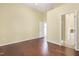 Spacious bedroom with hardwood floors and access to an en-suite bathroom at 115 White Lake Ct, Cary, NC 27519