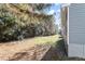 Fenced backyard featuring lush green surroundings and plenty of space at 1205 Freeman Dr, Sanford, NC 27330