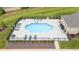 An inviting community pool area features lounge chairs, a well-maintained pool, and surrounding greenery at 122 Tall Timber Dr, Gibsonville, NC 27249