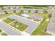 Community clubhouse with a refreshing pool, ample parking, and well-maintained green spaces for residents at 122 Tall Timber Dr, Gibsonville, NC 27249
