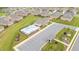 Aerial view of the community clubhouse featuring a sparkling pool, convenient parking, and lush landscaping at 122 Tall Timber Dr, Gibsonville, NC 27249