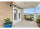 Covered patio with a ceiling fan, outdoor lighting, and a view of the backyard and mature trees at 122 Tall Timber Dr, Gibsonville, NC 27249