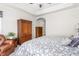 Warm main bedroom with ample natural light, tray ceiling, and elegant furniture at 122 Tall Timber Dr, Gibsonville, NC 27249