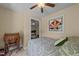 Cozy bedroom featuring a single bed, stained glass, and desk area at 12200 Glenlivet Way, Raleigh, NC 27613