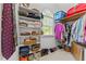 Spacious walk-in closet featuring ample shelving and storage for clothes and accessories at 12200 Glenlivet Way, Raleigh, NC 27613