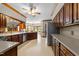 Spacious kitchen boasts wood cabinets, stainless steel appliances, and plenty of counter space at 12200 Glenlivet Way, Raleigh, NC 27613