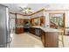 Well-appointed kitchen with modern appliances, wood cabinetry, and bright countertops at 12200 Glenlivet Way, Raleigh, NC 27613