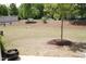 View of backyard featuring trees and greenery, and picnic table at 123 Hunston Dr, Holly Springs, NC 27540