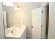 Dual vanity sink in spacious bathroom with neutral decor and modern lighting at 123 Hunston Dr, Holly Springs, NC 27540