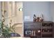 Elegant bar area with wooden cabinet for wine and liquor display at 1238 Exchange Pl, Durham, NC 27713