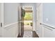 Bright entryway with hardwood floors, fresh paint, and a staircase to the upper level at 1238 Exchange Pl, Durham, NC 27713