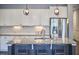 Modern kitchen featuring granite countertops, stainless steel appliances, and a stylish island with seating at 1238 Exchange Pl, Durham, NC 27713