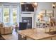 Cozy living room with fireplace, television, and comfortable seating at 1238 Exchange Pl, Durham, NC 27713
