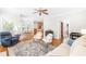 Inviting living room with hardwood floors and views into the dining and kitchen areas at 1241 Dalgarven Dr, Apex, NC 27502