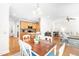 Open-concept living space connecting the kitchen, dining, and living areas, perfect for entertaining at 1241 Dalgarven Dr, Apex, NC 27502