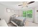 Cozy bedroom with a decorative bed frame and natural light from the window at 126 Star Thistle Ln, Cary, NC 27513