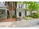 Charming townhome with brick accents, manicured landscaping, and a welcoming front entrance at 126 Star Thistle Ln, Cary, NC 27513