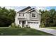 Charming two-story home with a two-car garage and landscaped front yard at 127 Vulcan St, Garner, NC 27529