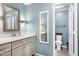 Bathroom offers a white sink with a large, decorative mirror at 1321 Bloomingdale Dr, Cary, NC 27511