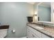 Well-lit bathroom features granite countertop, updated fixtures, and a fresh, clean aesthetic at 1321 Bloomingdale Dr, Cary, NC 27511