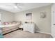 Bright bedroom featuring a cozy bed, dresser, and natural light from the window at 1321 Bloomingdale Dr, Cary, NC 27511