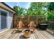 Relax on this backyard deck with comfortable seating and a cozy fire pit at 1321 Bloomingdale Dr, Cary, NC 27511