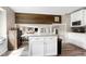 This kitchen island with granite countertops provides ample workspace and complements the warm wood accents at 1321 Bloomingdale Dr, Cary, NC 27511