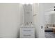 Elegant bathroom with marble countertop vanity and modern gold fixtures at 1400 Hedgelawn, Raleigh, NC 27615