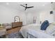 Well-lit main bedroom with modern decor, hardwood floors, and comfortable furnishings, creating a tranquil space at 1400 Hedgelawn, Raleigh, NC 27615
