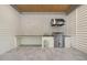 Outdoor kitchen featuring stainless steel grill and countertop space at 1400 Hedgelawn, Raleigh, NC 27615