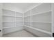 Well-organized pantry with ample shelving, providing plenty of storage space at 1400 Hedgelawn, Raleigh, NC 27615